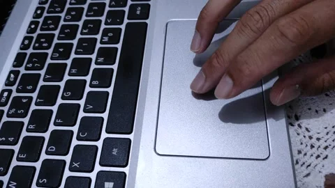 Using touchpad on keyboard of a laptop Stock Footage 226715201