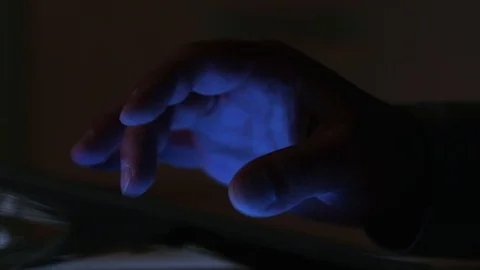 Using touchscreen at night Stock Footage 93623746