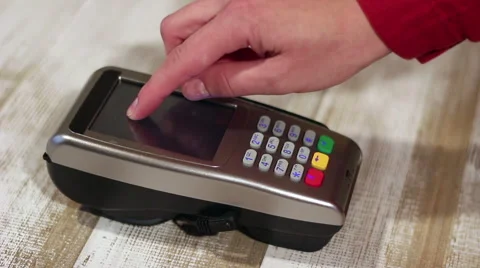 Using touchscreen of pos terminal. Stock Footage 65395468
