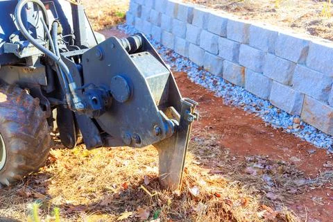 Using a trencher cable plow tractor to lay fiber optic cables Stock Photos