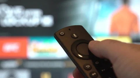 Using TV Remote Controller Stock Footage 99533599