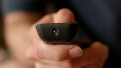 Using TV Remote At Home Stock-Footage 31560980