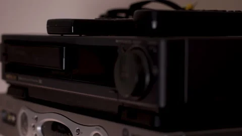 Using VCR for VHS tapes close up watching tapes. Home video tapes VHS. Stock Footage 301669283