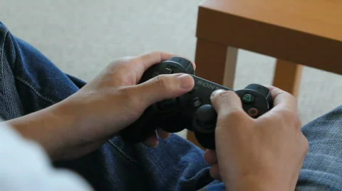 Using a Video Game Controller Stock Footage 737930