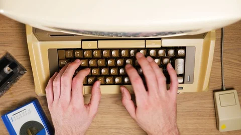 Using a Vintage70s 80s Computer Typing Top View Timelapse Stock Footage 126473738