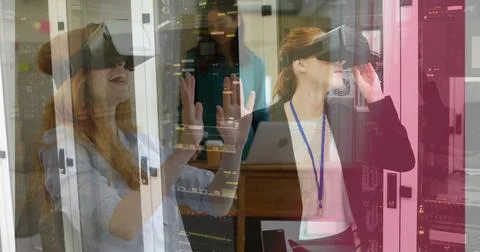 Using virtual reality headset, woman exploring data center image over server Stock Photos