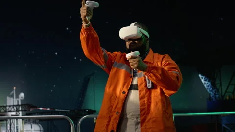 Using virtual reality, oil crisis issues and offshore platform engineer Stock Footage 336200415