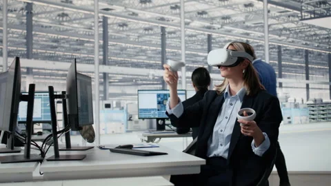 Using VR glasses equipment, PCB layout analysis and woman in RD office Stock Footage 335882141