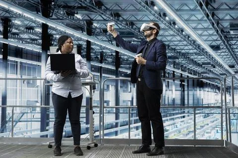 Using VR headset gear, semiconductors and man in modern factory Stock Photos