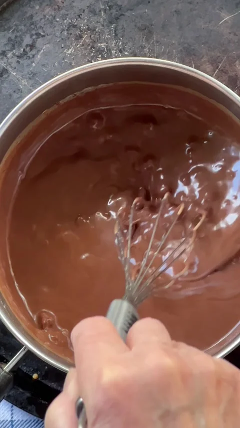 Using whisk to make ganache vertical Stock Footage 236585402