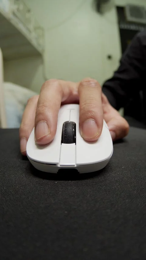 Using a White Mouse with a Swift Click on a Black Pad for a Quick Trick Stock Footage 335907775