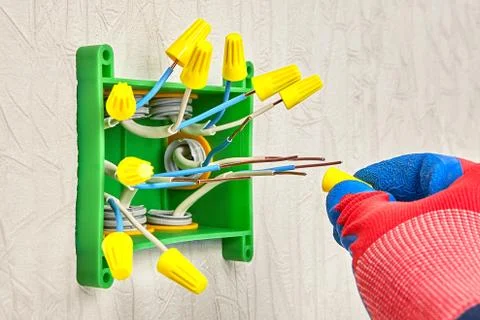Using wire nuts for electrical connections. 写真素材
