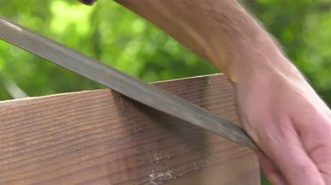 Using a wood rasp on the edge of a board Video stock 63505823