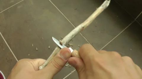 Using woodcarving knife. Stockbeeldmateriaal 56055801