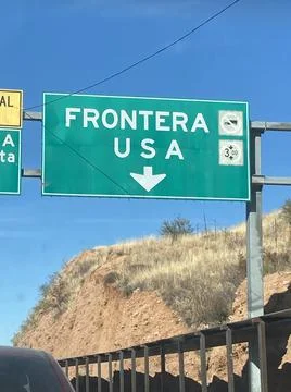 USMEXbordersign Stock Photos