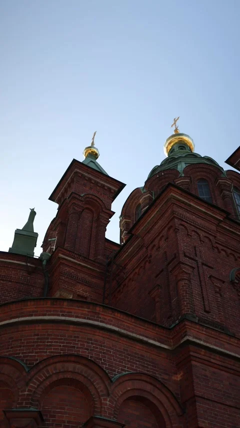 Uspenski Cathedral red brick walls and golden domes in sunlight Stock Footage 346545233
