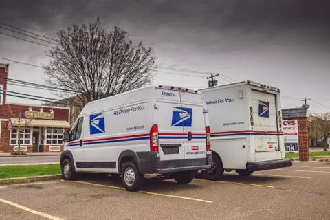 Usps Delivery trucks parked Stock Photos