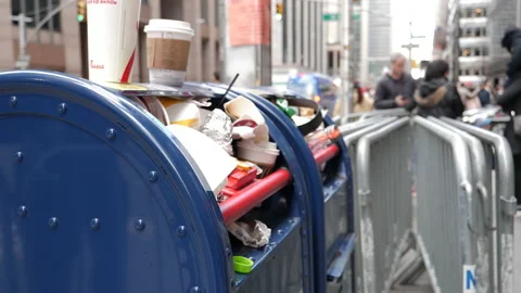 USPS mailbox filled with trash on New York City Street Stock Footage 170167831