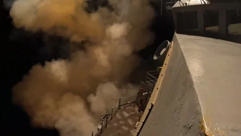USS Bainbridge (DDG-96) launches Tomahawk Land Attack Missiles, Epic Fury Stock Footage 334112457