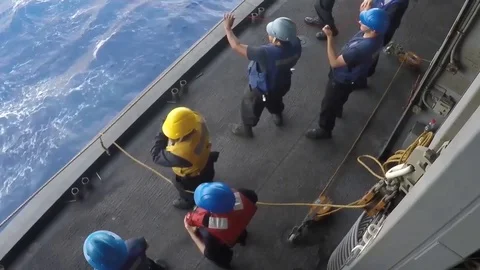 USS Bataan performs a connected replenishment at sea with USNS Laramie - 2017 Stock Footage 87706693