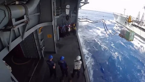 USS Bataan performs a connected replenishment at sea with USNS Laramie - 2017 Stock Footage 87706723