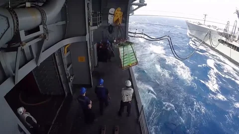 USS Bataan performs a connected replenishment at sea with USNS Laramie - 2017 Stock Footage 87706733