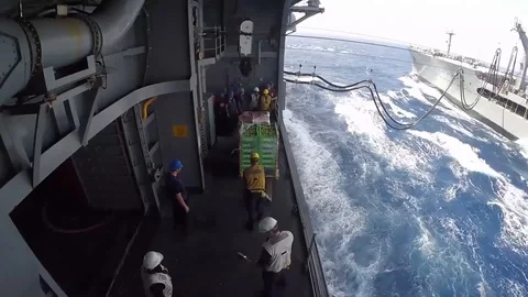 USS Bataan performs a connected replenishment at sea with USNS Laramie - 2017 Stock Footage 87706749