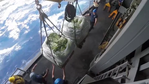 USS Bataan performs a connected replenishment at sea with USNS Laramie - 2017 Stock Footage 87706785