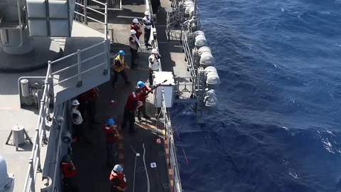USS Bataan performs a connected replenishment at sea with USNS Laramie - 2017 Stock Footage 87707095