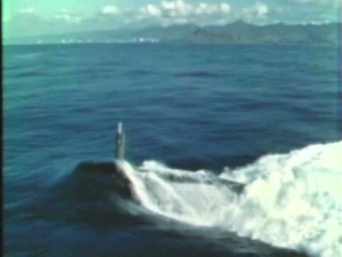The USS Daniel Boone surfaces dramatically in slow motion footage from theƒ Stock Footage 75284372