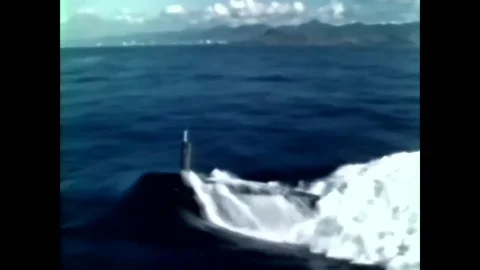 The USS Daniel Boone surfaces dramatically in slow motion footage from the Stock Footage 83139370
