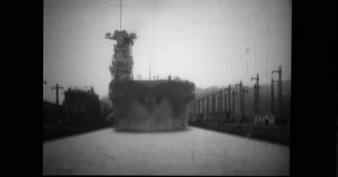 USS Saratoga (CV-3) moving through Panama canal lock Stock Footage