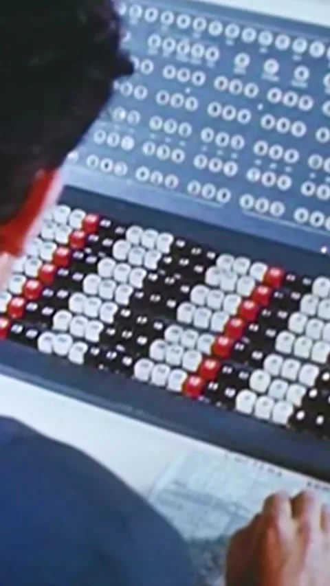 USSR - 1968 - Technicians work in a Soviet space program control room, with one Video stock 339105487