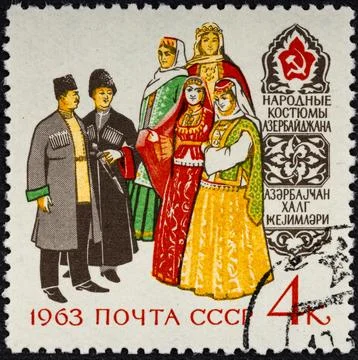 USSR - circa 1963: A post stamp printed in the Soviet Union shows folk costum Stock Photos