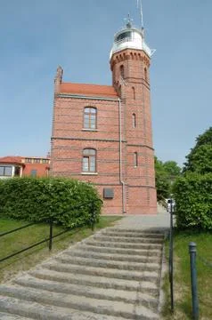 Ustka, Poland - May 24, 2014: Lighthouse in Ustka harbour in Poland Stock Photos