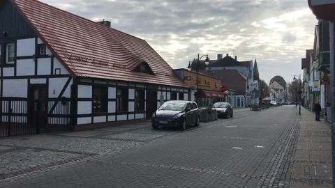 Ustka, Poland, A train is parked on the side of a building Video stock 134390122