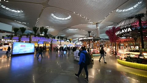 Usual busy day inside the new Istanbul passenger airport Видео 249665116