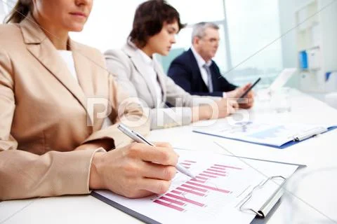 Usual working day at office, business people concentrating on work Stock Photos