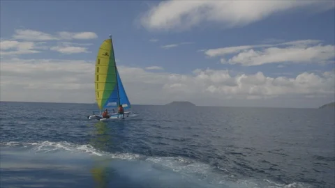 USVI St John Ocean Catamaran Glides Along Ocean with Blue Sky Stock Footage 123667200