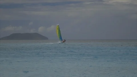 USVI St John Ocean Catamaran Comes Ashore Stock Footage 123667323