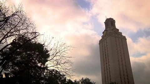 UT Tower - Austin Texas tilt down with clouds Stock Footage 82853539