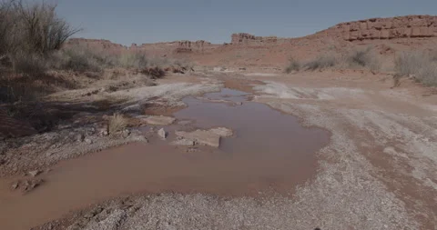 Utah Desert Stream in with Trickle Pools Salt Calcium White Crystals Deposit Stock Footage 175480259