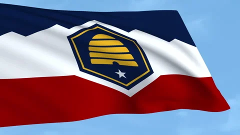 Utah flag waving on a clear blue sky Stock Footage 323638439