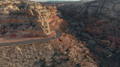 Utah - Flying Forward with Distant Car Through Rock Canyon 動画素材 96087096