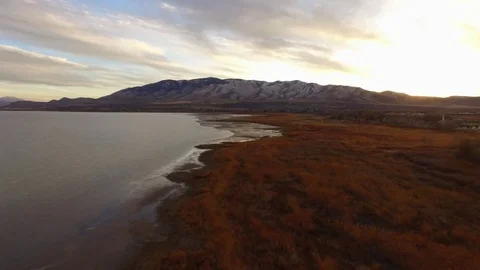 Utah Lake Low Flyover with Fall Colors and Sunset Vídeos de archivo 70866651