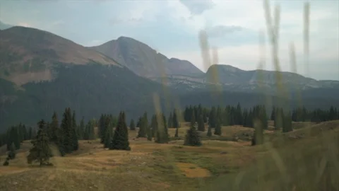 Utah mountains with grass in foreground Stock Footage 125799797