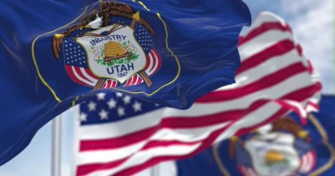 The Utah state flag waving along with the national flag of the United States Stock-Footage 197429435