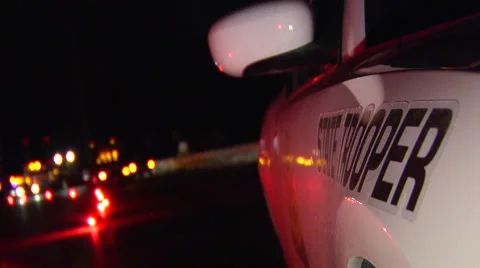 Utah state trooper at emergency scene at night on interstate. Stock Footage 45504862