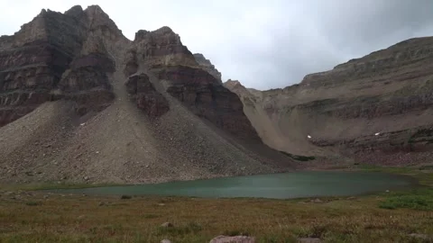 Utah Time Lapse: Uinta Mountains dark clouds over high mountain lake Stock Footage 146242532