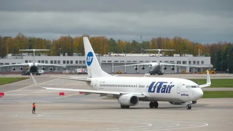 UTair Boeing 737-800 starting engines at Vnukovo Airport in Moscow Stock Footage 340106375
